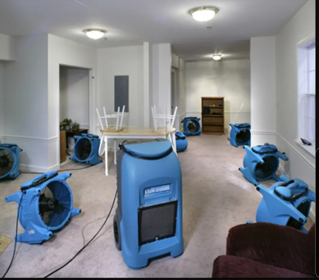Air movers and dehumidifier setup for Water Damage Restoration in Wells